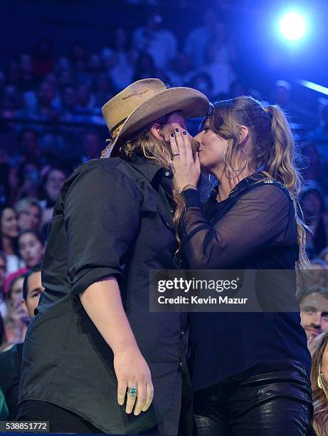Musician Chris Stapleton and Morgane Stapleton onstage during the 2016 CMT Music awards at the Bridgestone Arena on June 8, 2016 in Nashville,...