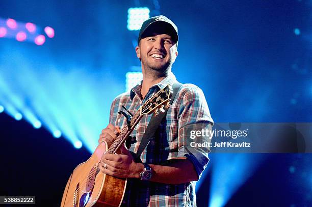 Luke Bryan performs onstage during the 2016 CMT Music awards at the Bridgestone Arena on June 8, 2016 in Nashville, Tennessee.