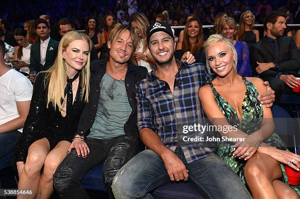 Actress Nicole Kidman, musicians Keith Urban and Luke Bryan, and Caroline Boyer attend the 2016 CMT Music awards at the Bridgestone Arena on June 8,...