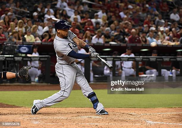 Desmond Jennings of the Tampa Bay Rays hits a line drive against the Arizona Diamondbacks at Chase Field on June 6, 2016 in Phoenix, Arizona.