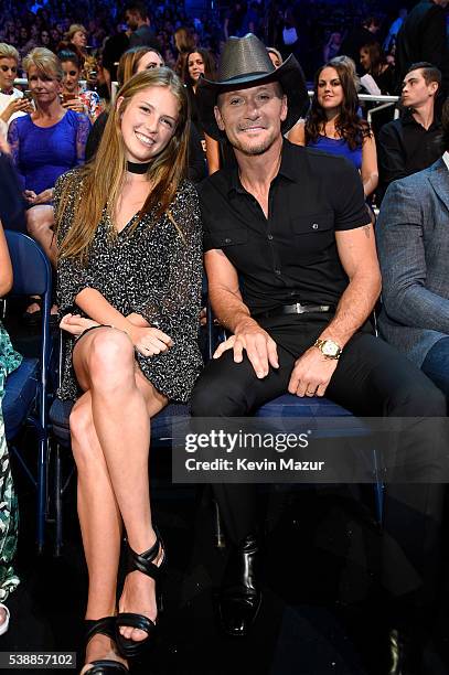 Tim McGraw and daughter attend the 2016 CMT Music awards at the Bridgestone Arena on June 8, 2016 in Nashville, Tennessee.