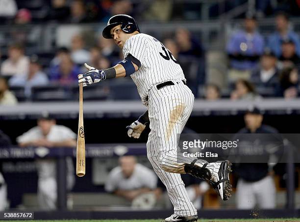 Carlos Beltran of the New York Yankees watches his two run home run as he heads for first base in the seventh inning against the Los Angeles Angels...