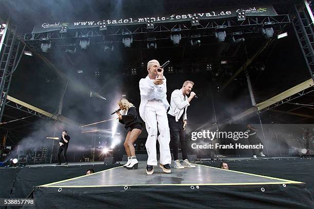 Singer Avriel Kaplan, Kirstin Maldonado, Mitchell Grassi, Scott Hoying and Kevin Olusola of the American band Pentatonix perform live during a...