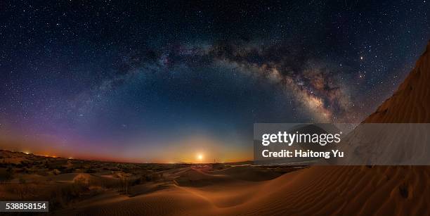 milky way bridge over huge sand dunes - starry vault stock pictures, royalty-free photos & images