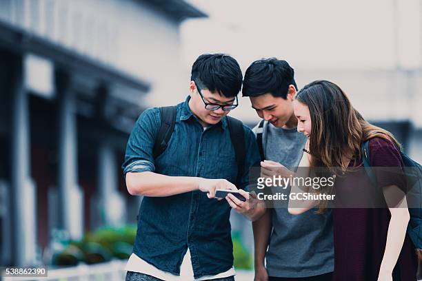social media could be fun, group of students in japan - international students stock pictures, royalty-free photos & images