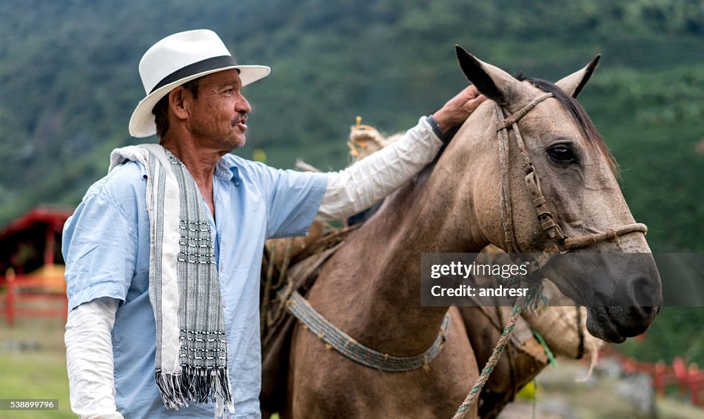 Colombian farmer working at a coffee farm