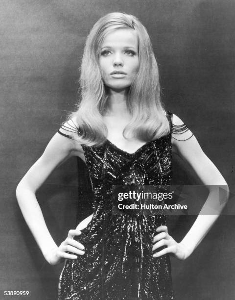 German countess and fashion model Veruschka perfects the disaffected supermodel look with her hands on her hips and her lips pursed, circa 1968.