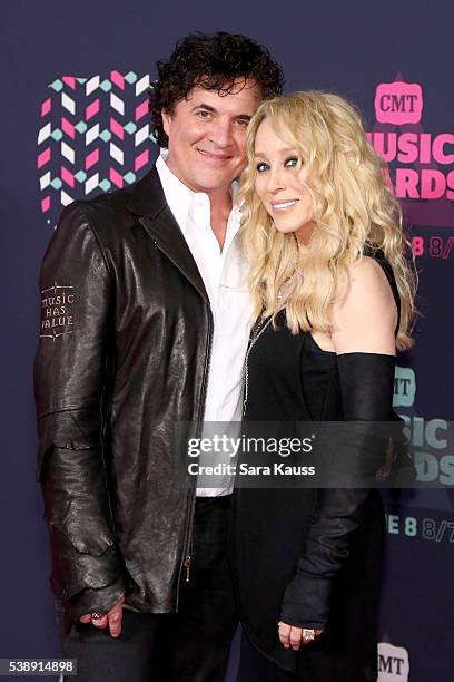 Big Machine Label Group's Scott Borchetta and Sandi Spika Borchetta attend the 2016 CMT Music awards at the Bridgestone Arena on June 8, 2016 in...