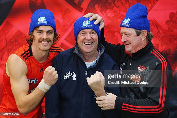 Joe Daniher of the Bombers Neale Daniher and Kevin Sheedy pose during an Essendon Bombers AFL media and training session at True Value Solar Centre...