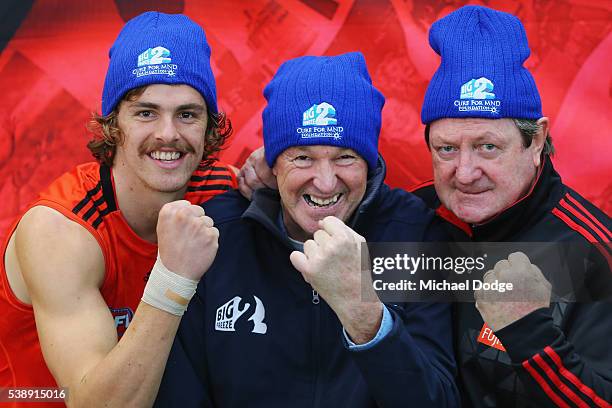 Joe Daniher of the Bombers Neale Daniher and Kevin Sheedy pose during an Essendon Bombers AFL media and training session at True Value Solar Centre...