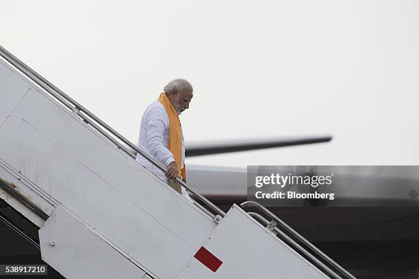 Narendra Modi, India's prime minister, disembarks an Air India Ltd. Aircraft in Mexico City, Mexico, on Wednesday, June 8, 2016. The U.S. Is India's...