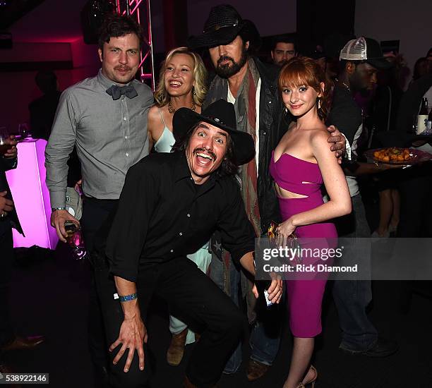 Travis Nicholson, Joey Lauren Adams, Jon Sewell, Billy Ray Cyrus,and Chelsea Talmadge attend the 2016 CMT Music awards at the Bridgestone Arena on...