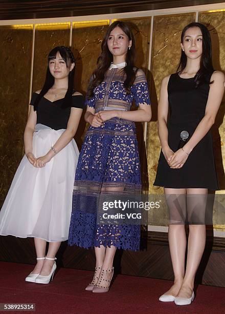 Singers Fei Qinyuan and Wu Zhehan of SNH48, and actress Tang Mengya attend the 22nd Shanghai TV Festival on June 8, 2016 in Shanghai, China.