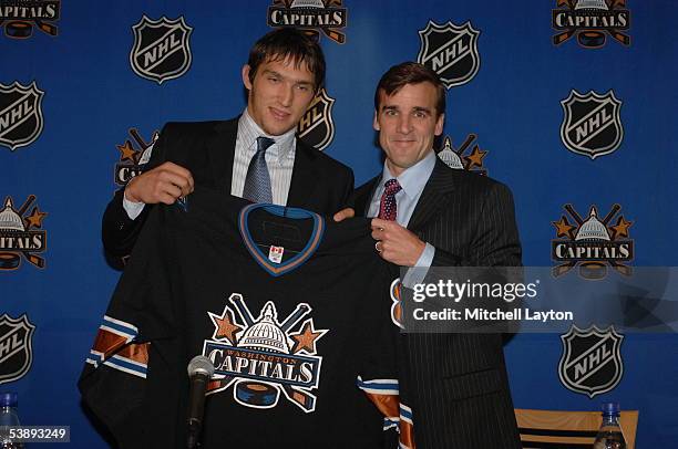 Alexander Ovechkin, the Washington Capitals 2004 first round draft pick, is introduced at a press conference with George McPhee vice president and...