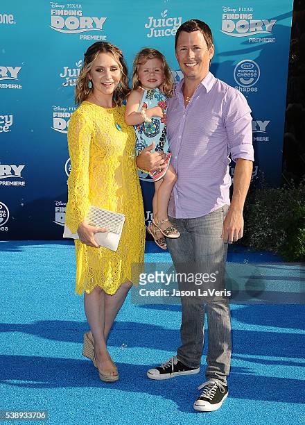 Actress Beverley Mitchell, husband Michael Cameron and daughter Kenzie Cameron attend the premiere of "Finding Dory" at the El Capitan Theatre on...