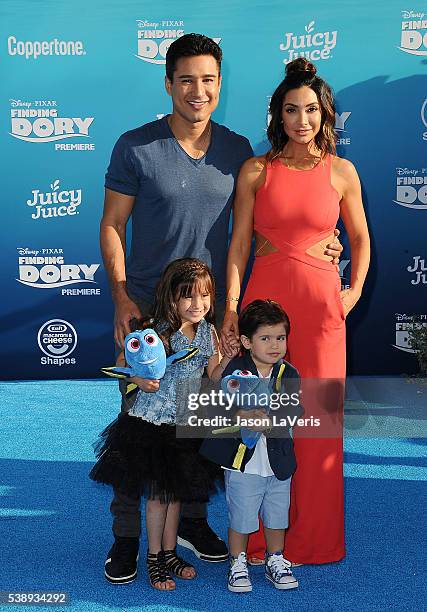 Mario Lopez, wife Courtney Laine Mazza and children Gia Francesca Lopez and Dominic Lopez attend the premiere of "Finding Dory" at the El Capitan...