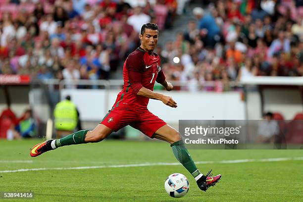 Portugals forward Cristiano Ronaldo scores goal during international friendly match between Portugal and Estonia in preparation for the Euro 2016 at...