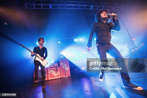 Guitarist Omar Rodriguez Lopez and singer Cedric Bixler-Zavala of At The Drive In performs onstage at Showbox SoDo on June 8, 2016 in Seattle,...