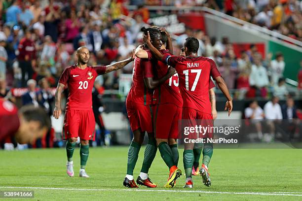 Portugals forward Eder celebrates after scoring a goal with team mates during international friendly match between Portugal and Estonia in...
