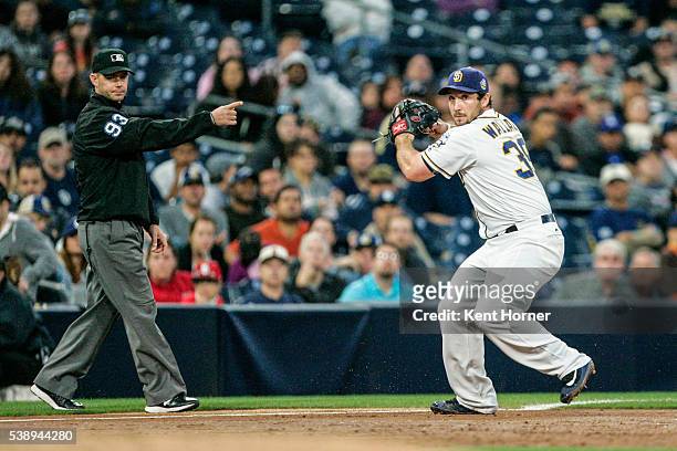 Brett Wallace of the San Diego Padres fields the ball in the second inning against the Atlanta Braves at PETCO Park on June 6, 2016 in San Diego,...