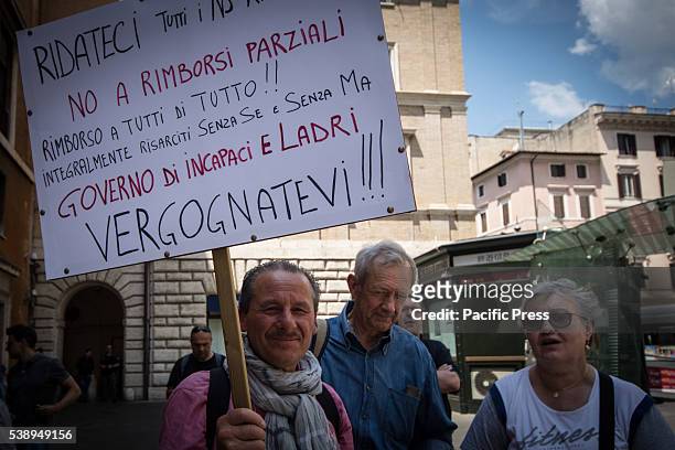 Protester raising a placard during protest against CONSOB in Rome. The "victims of saving banks' protest against the Commissione Nazionale per le...
