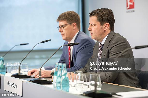 Of the Deutsche Fussball Liga DFL Christian Seifert and Media Director of the DFL Christian Pfennig are seen during the DFL audio-visual media rights...