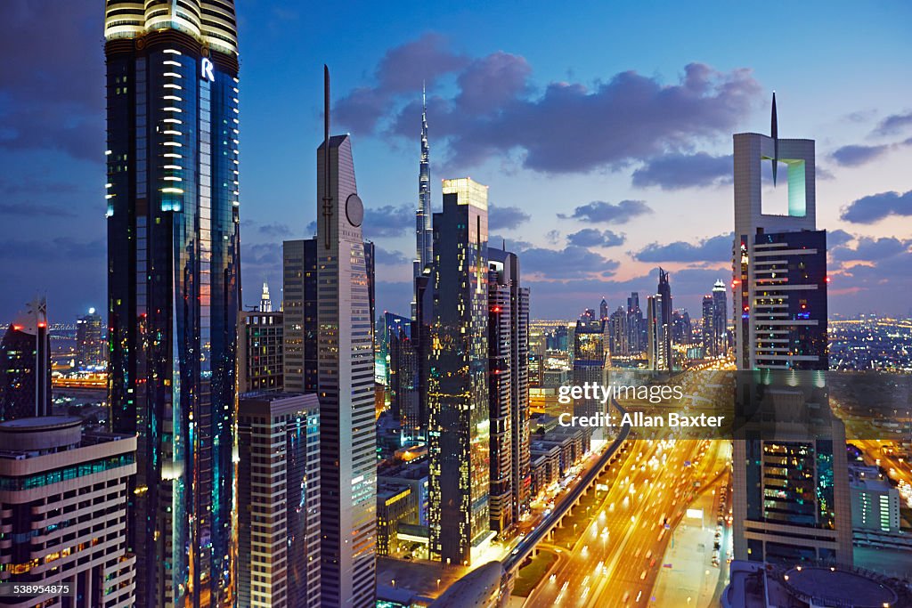 Elevated cityscape of Dubai illuminated at night