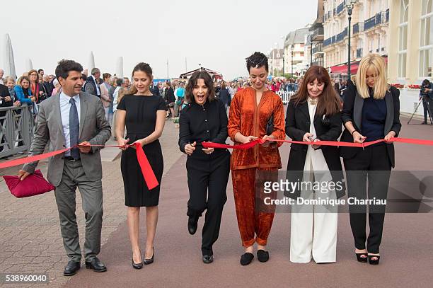 Mayor of Cabourg Tristan Duval, Virginie Ledoyen, Juliette Binoche, Loubna Abidar, Aiane Ascaride and Emmanuelle Beart attend the Inauguration of...