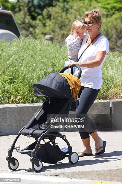 Doting grandma, Sharon Bingle spends time with grandson Rocket Zot Worthington at a park on May 23, 2016 in New York, USA.
