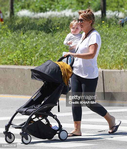 Doting grandma, Sharon Bingle spends time with grandson Rocket Zot Worthington at a park on May 23, 2016 in New York, USA.