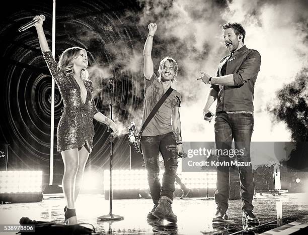 Maren Morris, Keith Urban and Brett Eldredge perform onstage during the 2016 CMT Music awards at the Bridgestone Arena on June 8, 2016 in Nashville,...