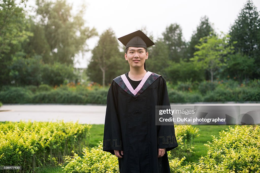 Chinese Spring Graduation Cap Chinese Student In Graduation Cap And Gown High-Res Stock Photo - Getty ...