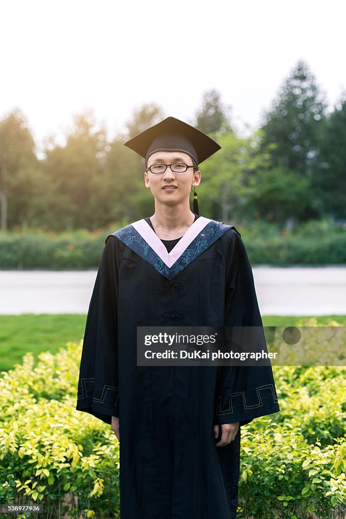 Chinese Spring Graduation Cap Chinese Student In Graduation Cap And Gown High-Res Stock Photo - Getty ...