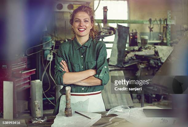 stonecutter woman portrait - female artist stock pictures, royalty-free photos & images