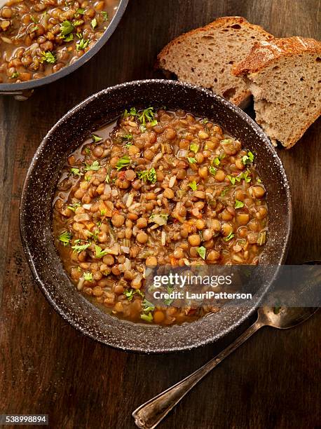 lentil soup with crusty bread - lentil soup stock pictures, royalty-free photos & images