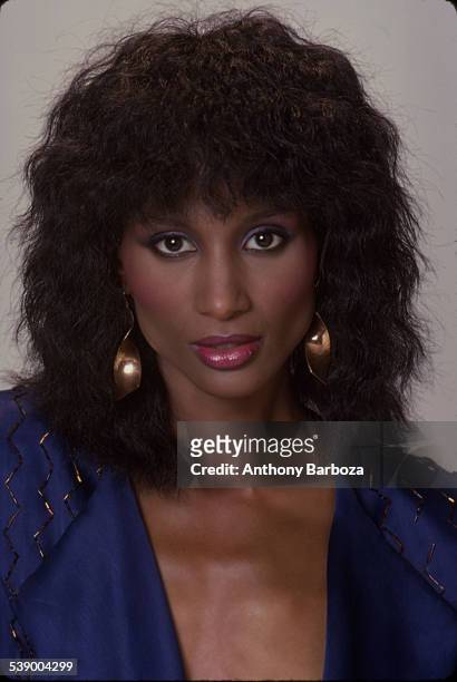 Portrait of model Beverly Johnson in a blue top, New York, 1980s.