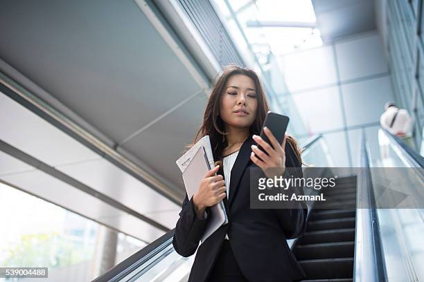 checking for wifi networks - executive on the move stock pictures, royalty-free photos & images