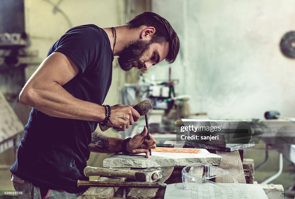 Stonecutter portrait at work