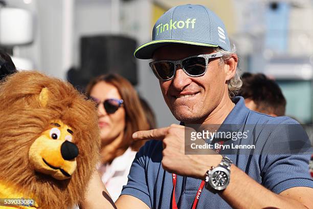 Tinkoff Team owner Oleg Tinkov points to the stage winners toy presentation lion after stage four of the 2016 Criterium du Dauphine from Criterium du...