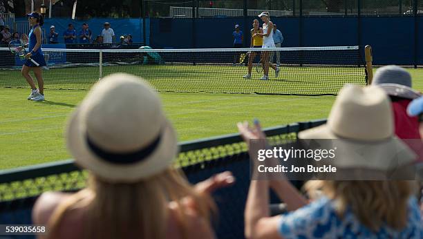 Naomi Broady of Great Britain and Anastasia Sevastova of Latvia celebrate during her match against Yifan Xu and Saisai Zheng of China on day four of...