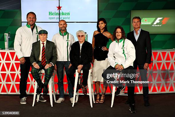 Heineken announces global partnership with Formula One Management. F1 supremo Bernie Ecclestone, centre, joins Gianluca Di Tondo, Senior Director...