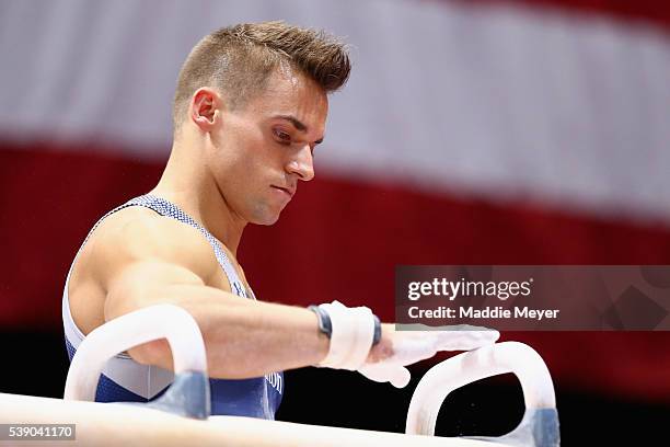 Sam Mikulak prepares to compete in the pommel horse during the Men's P&G Gymnastics Championships at the XL Center on June 3, 2016 in Hartford,...