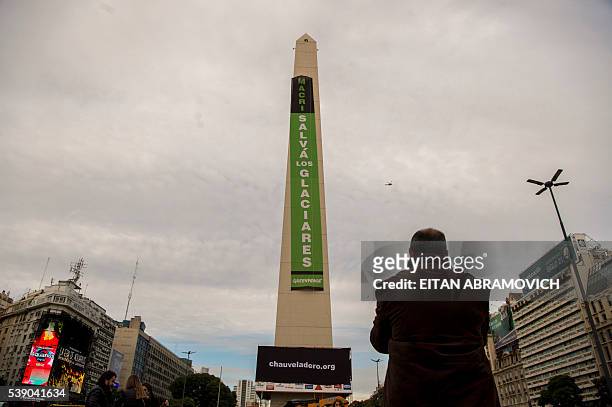 Environmentalists from Greenpeace unfurled a banner at the Obelisk of Buenos Aires on June 09 to ask president Mauricio Macri greater protection of...