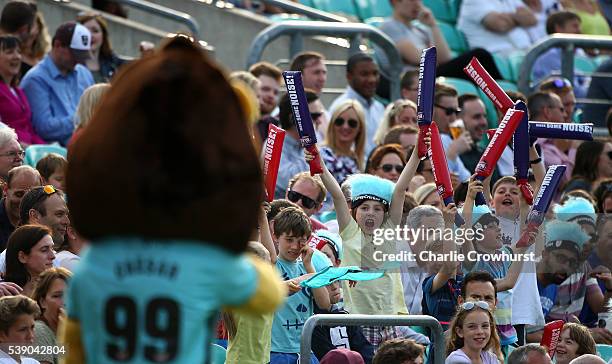 Young Surrey fans enjoy the cricket during the NatWest T20 Blast match between Surrey and Hampshire at The Kia Oval on June 9, 2016 in London,...