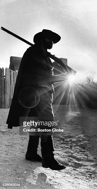 George Newcomb walks down the street at Plimoth Plantation in Plymouth, Mass., on Nov. 27, 1974.