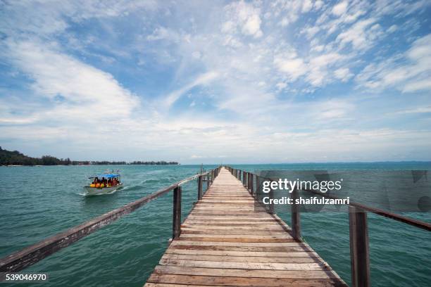 wooden jetty in sibu island of johor, malaysia - sibu river stock pictures, royalty-free photos & images