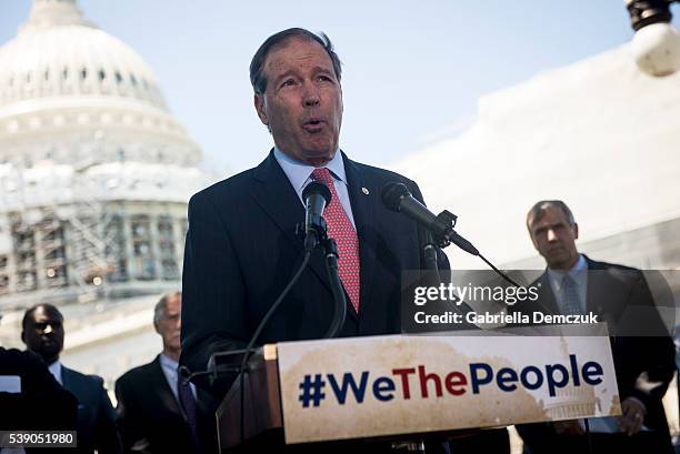 Sen. Tom Udall speaks to reporters at a news conference dubbed #WeThePeople outside the Capitol on June 9, 2016 in Washington, D.C. Senate Democrats...