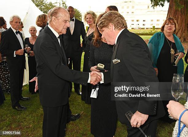 Prince Philip, Duke of Edinburgh, and Robert Wade attend the Duke of Edinburgh Award 60th Anniversary Diamonds are Forever Gala at Stoke Park on June...