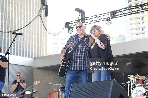 Ken Block of the band Sister Hazel with Jamie O'Neal on the Ascend Stage during CMA Festival on June 9, 2016 in Nashville, Tennessee.