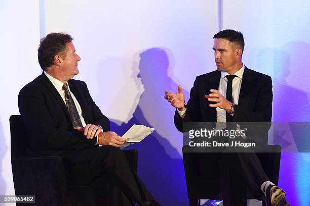 Piers Morgan interviews Kevin Pietersen during The KP24 Foundation Charity Gala Dinner at The Waldorf Hilton Hotel on June 9, 2016 in London, England.
